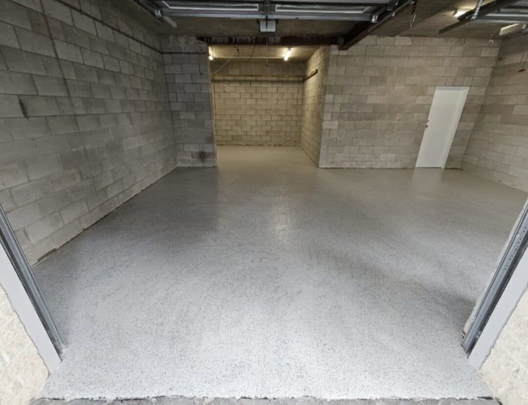 Premium metallic epoxy garage floor by Fortress Floors